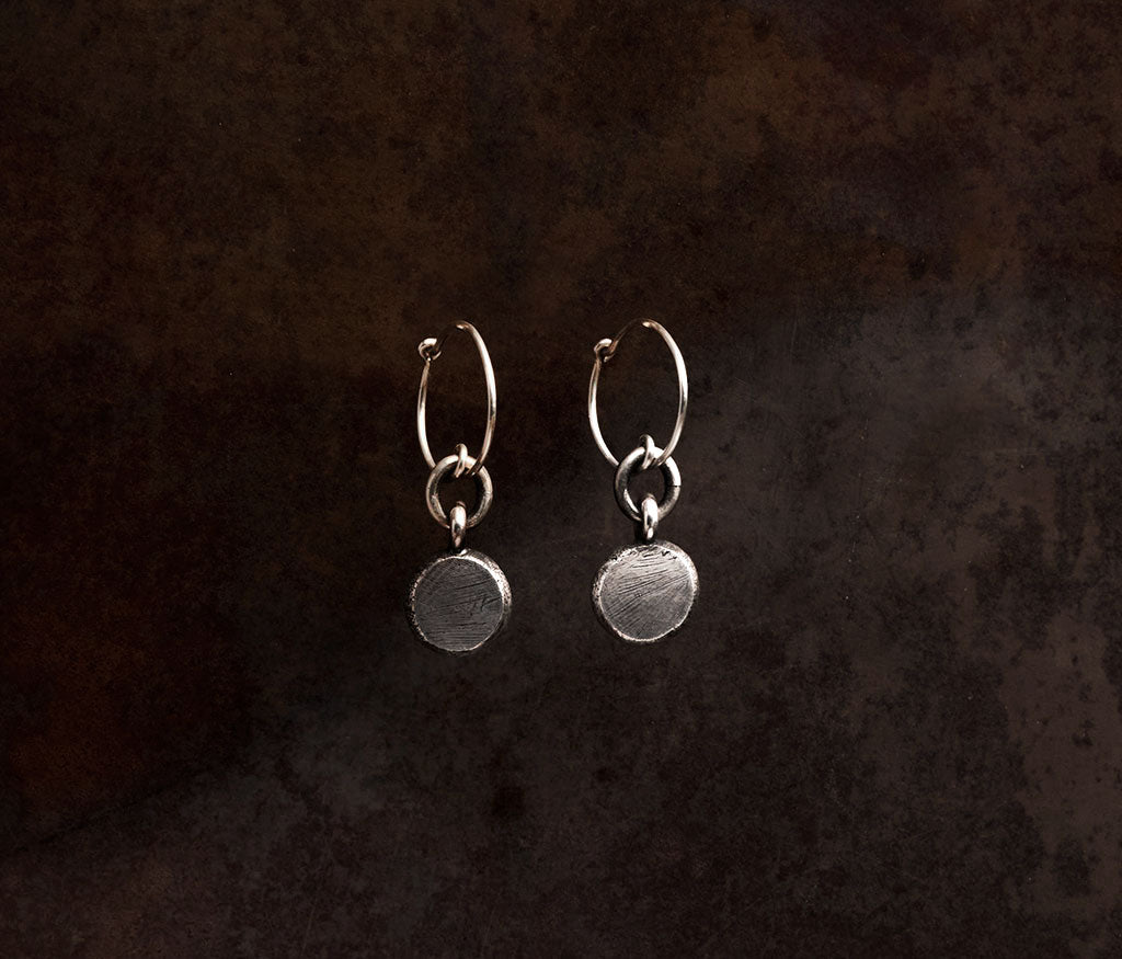 earrings pendant scratched